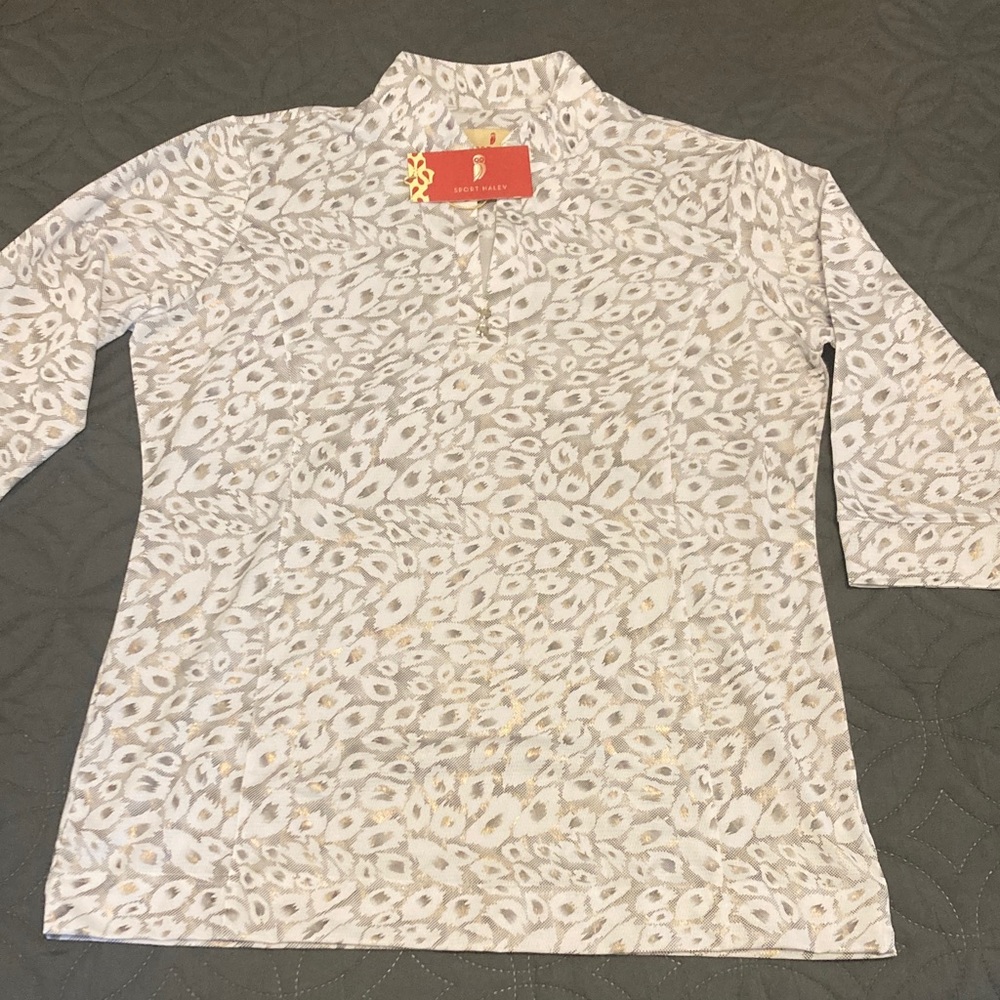 MAKE AN OFFER!
Sport Haley Leopard Print Ladies Top 3/4 sleeve
Brand new!
